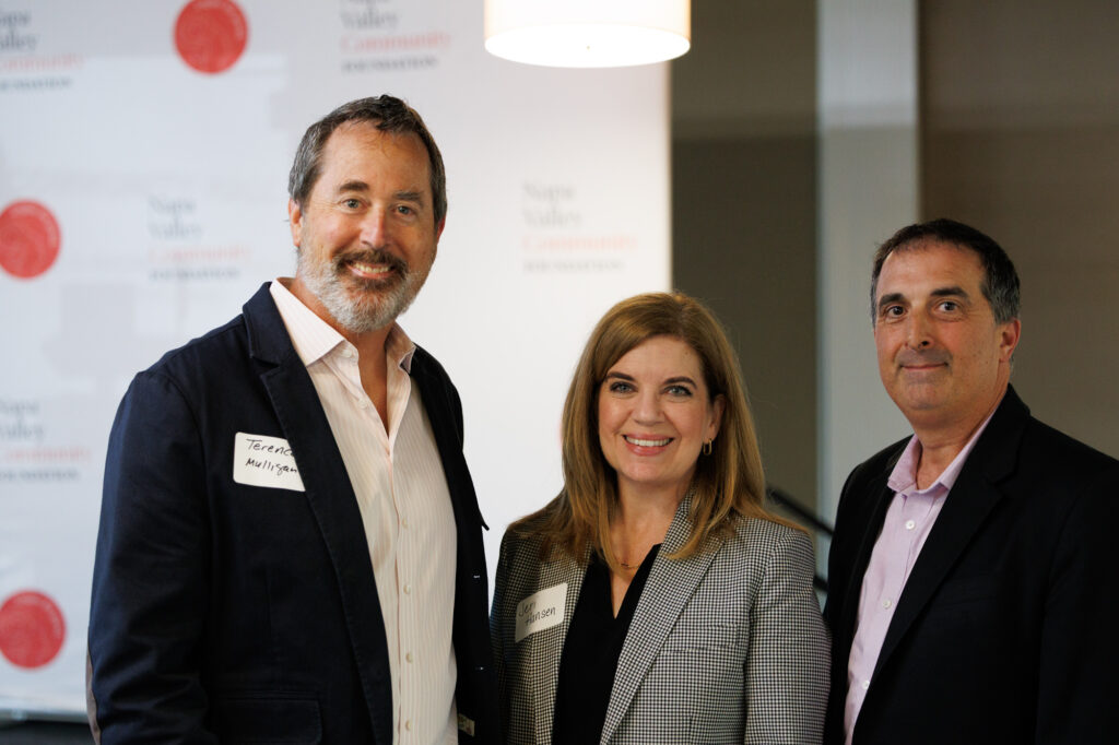 Terence Mulligan, President & CEO of Napa Valley Community Foundation stands with Jeri Hansen, President & CEO of Napa Valley Chamber of Commerce, and Dr. Robert Eyler, Professor of Economics for Sonoma State University